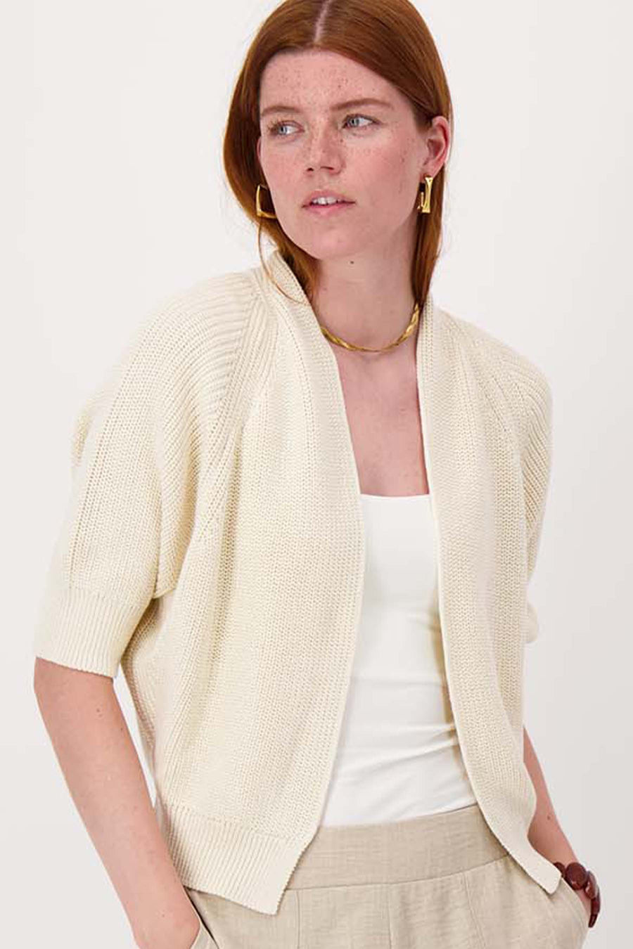 cardigan with batwing sleeves and heart brooch | off-white