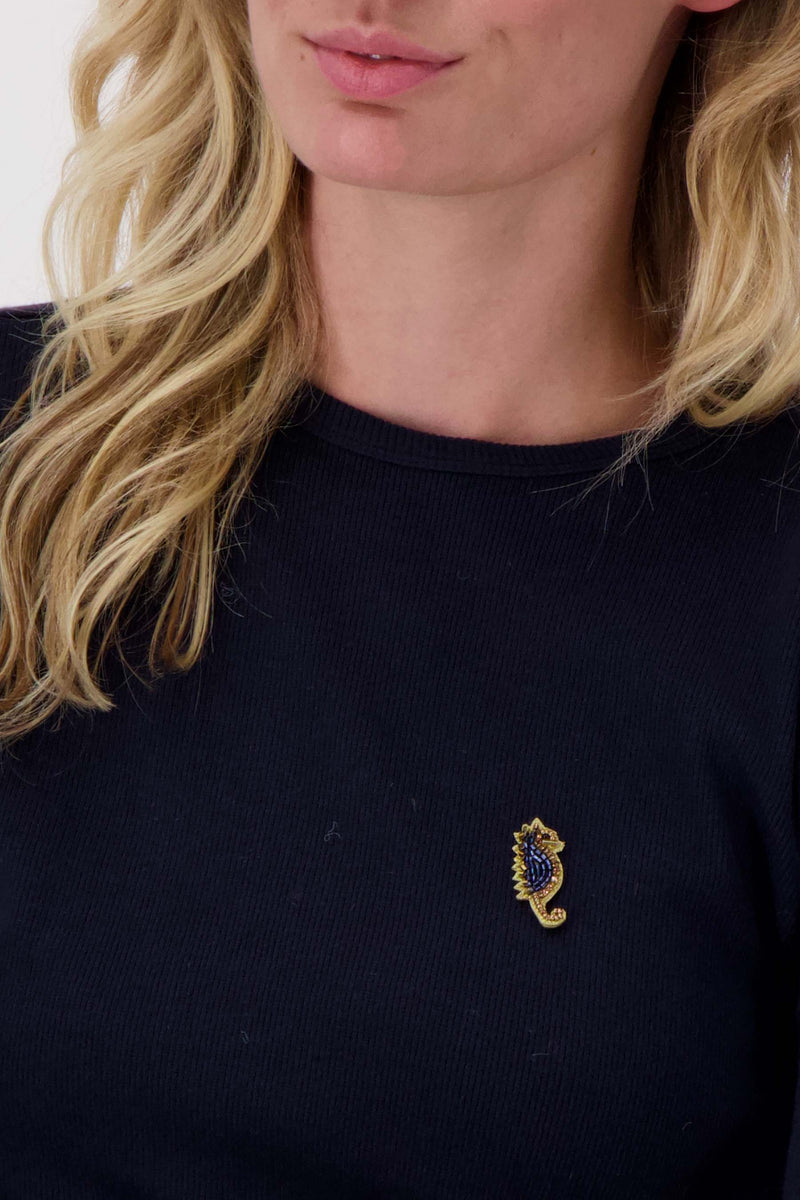 seahorse brooch | classy red